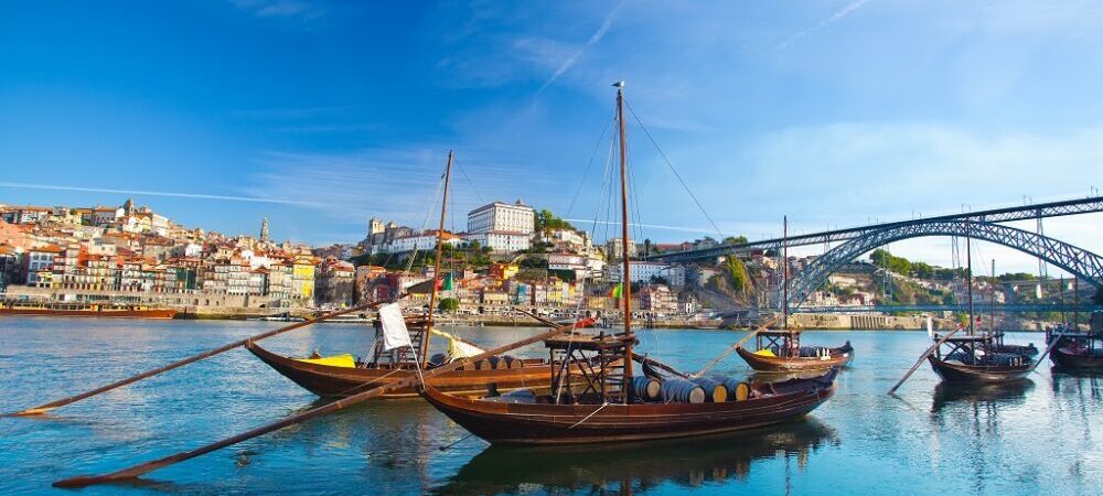old Porto and traditional boats with wine barrels